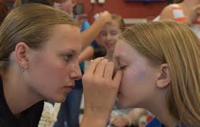 High school cast visits elementary schools for teaser performance