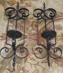 Make a dramatic impact with a stunning wall decoration using black. Pair Large Vintage Wrought Iron Wall Sconce Pillar Candle Holder Gothic Spanish 1922462117