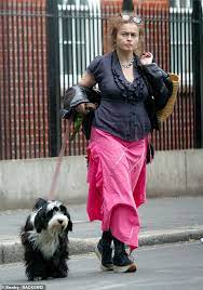 Elle est reconnue pour ses interprétations de personnages excentriques et originaux. Helena Bonham Carter Dons Ruffled Blouse Teamed With Pink Skirt As She Takes Dog Pablo For A Walk Readsector Female