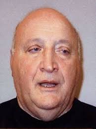 Genovese soldier, Louis “Louie The Hood” Georgiano [1911-1965]. Georgiano  was a soldier in Rosario “Saro” Mogavero's crew. He operated Club 176, at  176 Worth Street, a hangout for parole officers and judges.