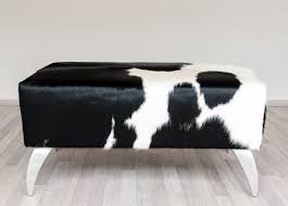 Black And White Cowhide Ottoman A Small Black And White Cowhide Ottoman That Was Used In A Bathroom By Gorgeous Creatures Www Gorgeouscreatures Cowhide Ottoman Leather Ottoman Faux Cowhide