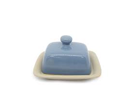 Pick up a metal butter dish in a vintage style if you love retro kitchen accessories, or choose a clear plastic butter dish for a touch of modern style. Modern Rustic Glazed Pottery Butter Dish Futon Company