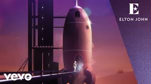 In His Own Interpretation Of Elton S Iconic Hit Iranian Filmmaker And Refugee Majid Adin Reimagines Rocket Man Elton John Music Videos Youtube Videos Music
