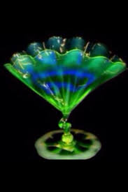 Uranium glass contains a very small amount of radioactive uranium, so they are, technically, radioactive, and the student, who wishes to remain anonymous, made the but break it up into a fine powder, for example by shooting it at something, and depleted uranium becomes very dangerous. Uranium Glass