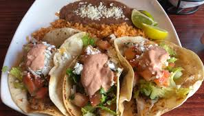 Beer battered white fish on a fresh tortilla and some simple fixings. National Taco Day Where To Find Tacos From Naples To Fort Myers
