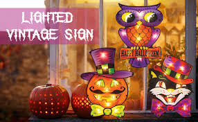 Use marquee lights to give each pumpkin a letter that will spell out a seasonal message when celebrate autumn with a mantel covered in antiques, white pumpkins, and chippy window frames. Amazon Com Twinkle Star 16 X 12 Inch Halloween Decorations Lighted Vintage Jack O Lantern Pumpkin Window Silhouette Decoration 10 Led High Voltage Light Up Holiday Party Home Yard Art Indoor Outdoor Ornament Garden Outdoor