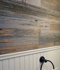 This week's vlog is a super easy wall panelling tutorial. Grey Barn Wood Wall In A Bathroom Wood Panel Walls Barn Wood Reclaimed Wood Paneling