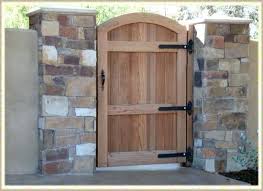 Arched Wooden Garden Gates Uk A Gorgeous Wooden Gate To Offer A Warm Invitation Yet At The Same Time Suggest Priva Wooden Garden Gate Garden Doors Garden Gates