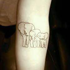 Pin By Sophie Sgr On For Princes Elephant Tattoos Elephant Tattoo Small Elephant Family Tattoo