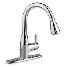 A sink aerator thread to hose connection adapter (piece at left on photo; Fairbury 1 Handle Pull Down High Arc Kitchen Faucet American Standard