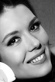 EMMA PEEL (Diana Rigg 1938-2020) of THE AVENGERS, the British 1960s  adventure television series which ran from 1960 to 1969 with Patrick Mcnee  as John Steed. We all loved this series.