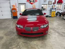 Image result for Medium Red 2004 Pontiac