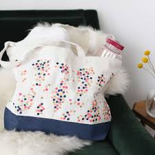 Lay your canvas painting on a flat, protected workspace. Diy Painted Canvas Tote Bag