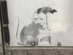 In an apparent reference to the use of masks on public transportation, another of banksy's rats is using its face covering as a parachute. Banksy Artwork Discovered In Tokyo As Japanese Officials Rush To Verify Graffiti The Independent The Independent