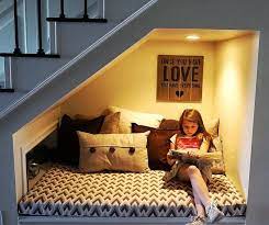 4 Cozy Reading Nooks You Ll Want In Your Home Right Now Cushion Source Blog Stair Nook Cozy Reading Nook Home Decor