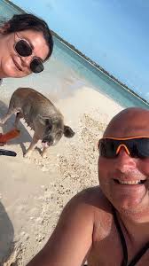 SWIMMING WITH THE PIGS Scott and Shanna Dupre of VILLE PLATTE