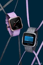 With The Special Edition Fitbit Versa You Get A Signature Woven Band In Lavender Or Charcoal Pictured Here A Black Smart Watch Fitness Watch Tracker Fitbit
