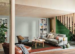 Curls, waves and ribbons of color collide and play on a sage green background. What To Know About Decorating With Sage Green