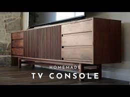 It is crafty design that features six small drawers on the side and two cabinets in the middle that open up for more shelving space. Diy 3 8ft Mid Century Modern Tv Console Youtube