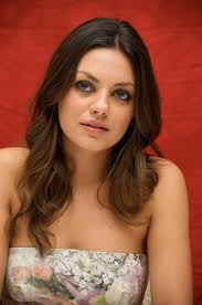Mila Kunis ( in character ) Dr. Sharon Gil (