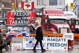 The Canadian trucker convoy protest is an unpopular uprising | Vox