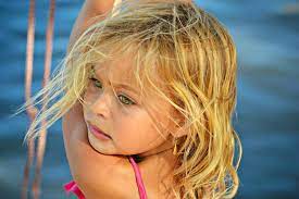 Beautiful Child With Blonde Hair Green Eyes And Tanned Skin Blonde Green Eyes Tan Blonde Tan Skin