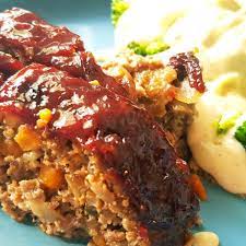 To minimize cracking, smooth the top of the loaf by rubbing in a little cold water before baking. Meat Loaf Beef Recipes Crusted Chicken Meatloaf