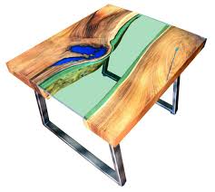 Car part art, wooden toy trucks, and many other unique pieces!! Live Edge River Coffee Table Glowing In The Dark With Industrial Brushed Legs Fine Wooden Creations