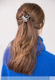 Pretty Half Up Half Down Hairstyle Secured With A Crescent Moon Hair Clip Complete With Happy Face And Dangling Half Up Hair Clip Hairstyles Thick Hair Styles