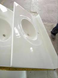 A cultured marble vanity top includes an integral sink that comes attached to the counter itself. Solid White Cultured Marble Vanity Top Marble Double Sink Vanity Top Faux Marble Top Cultured Marble Table Tops Cultured Marble Suppliers