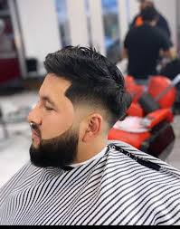 Champions Barbershop is with Antonio Martinez Barrera and D'Ziil Gomez.