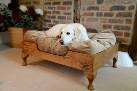 Similar to a cot, an elevated dog bed is made with a piece of fabric pulled extremely tight over a sturdy frame. Choosing A Raised Dog Bed