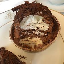 An Interior Slice Through A Chocolate Merveilleux With Layers Of Mouse Meringue And Chocolate Picture Of Meert Lille Tripadvisor