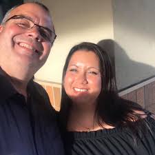 Are there liquor stores in the Broadway area to purchase items for a room?