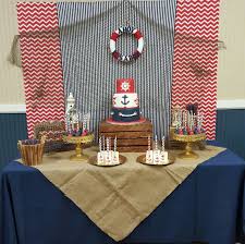 Perfect to include in your baby shower decorations, this cupcake holder is the perfect spot to place all those pastries and tasty treats! Nautical Baby Shower Dessert Table And Backdrop Baby Shower Dessert Table Baby Boy Shower Nautical Baby Shower Boy