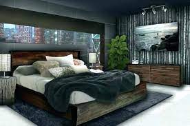 The bed is a simple platform bed with white linens and a blue accent. Image Result For Bedroom Furniture Men S Male Bedroom Ideas Home Decor Bedroom Bedroom Interior