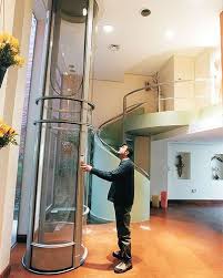 The Pneumatic Tube C Nationwide Lifts Inc House Elevation Home Glass Elevator