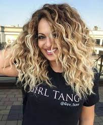 10 Hairdos For Any Age That Make You Look Younger Mid Length Curly Hairstyles Curly Hair Styles Naturally Curly Hair Styles