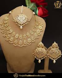 Crafted To Perfection Featured Gold Finished Pearl Jadau Necklace Set Shop Our Latest Collect Traditional Jewelry Gold Jewelry Fashion Bridal Gold Jewellery