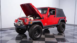 Image result for Flame Red 2005 Jeep