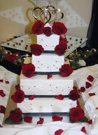 At the photo #4 you can see the color combination of white and red, at the photo #1,2,3 you can see the color combination of ivory. Red White Wedding Cakes Stylish Eve