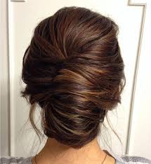 It is then secured with barrettes, combs, hair sticks and/or hairpins. Smooth French Twist Updo On Brown Hair Easy Updos For Long Hair Hair Styles Long Hair Styles
