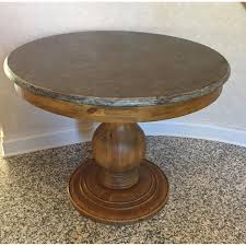 Specify top finish when ordering. Arhaus Luca Round Dining Table W Bluestone Top In Barnwood Brown Aptdeco