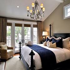 1 Master Bedroom Accented Neutral Shades Of Brown Tan And Eggshell With A Navy Accent Blue Master Bedroom Master Bedrooms Decor Master Bedroom Accents