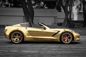 widebody corvette c7 with gold wrap and huge forgiato rims is bling overdose carscoops widebody corvette c7 with gold wrap and