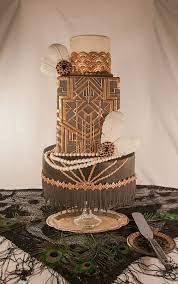 (photo via belle the magazine) lavish wedding cake don't forget to top the night off with a toast of champagne and delectable wedding cake. The Great Gatsby Have A Wedding Cake That Shows Of Your Personality And Love You Have For Each Other Through The Art Deco Cake Gatsby Cake Great Gatsby Cake