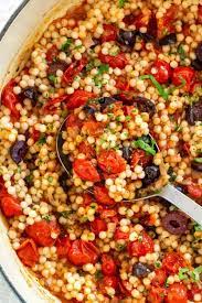 Near east oil pearled couscous, roasted garlic & olive, 4.7 ounce, pack of 12 brand: Israeli Couscous With Tomato And Olives Jessica Gavin
