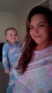 Can someone fix my sister's eyes in this photo?