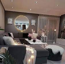 Gold geometric pattern wallpaper, grey carpet, large indoor plant in corner in formal sitting room with touches of gold and blue. Decorating A Sitting Room Decorative Pictures For Living Room Living Room Ideas Pinterest In 2021 Cozy Living Rooms Pinterest Living Room Apartment Living Room Design