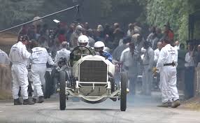 Watch a 110-year-old Mercedes-Benz grand prix racer take on the Goodwood  hill climb